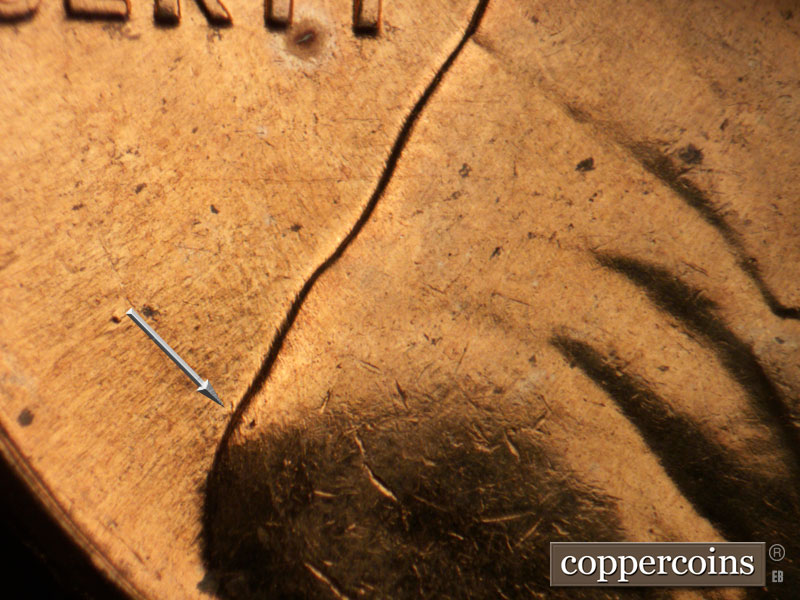 Die-stage B marker on 1960D•1MM•235 (1960 Repunched Mint Mark).