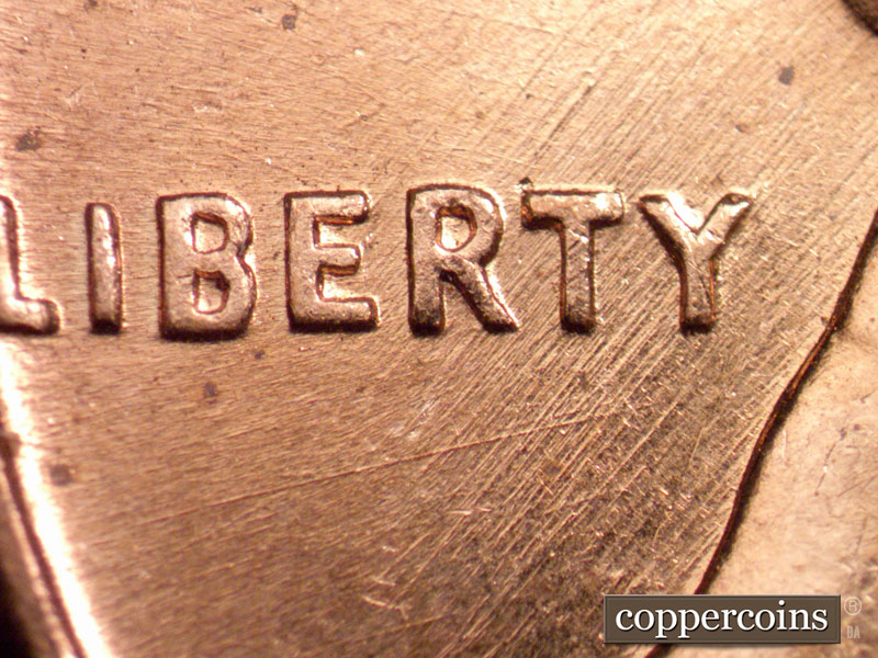 Die-stage B marker on 1960D•1MM•238 (1960 Repunched Mint Mark).