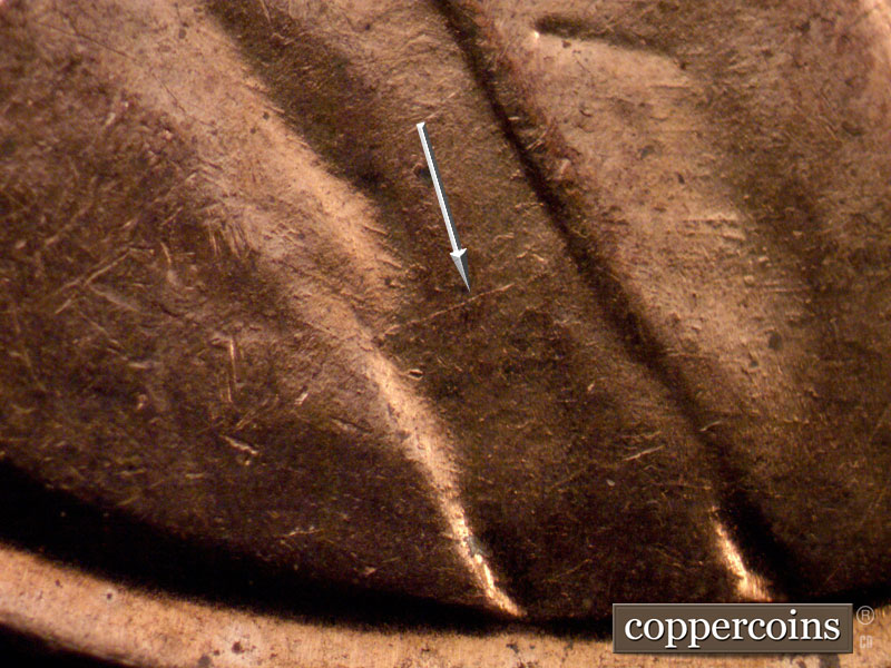 Die-stage B marker on 1960D•1MM•242 (1960 Repunched Mint Mark).