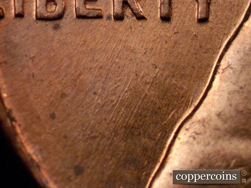 Die-stage B marker on 1960D•1MM•242 (1960 Repunched Mint Mark).