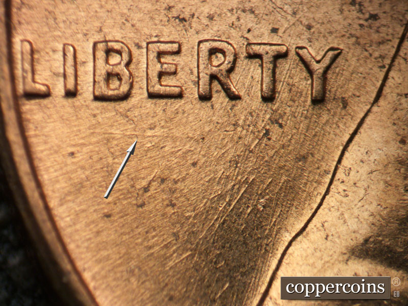 Die-stage B marker on 1960D•1MM•244 (1960 Repunched Mint Mark).