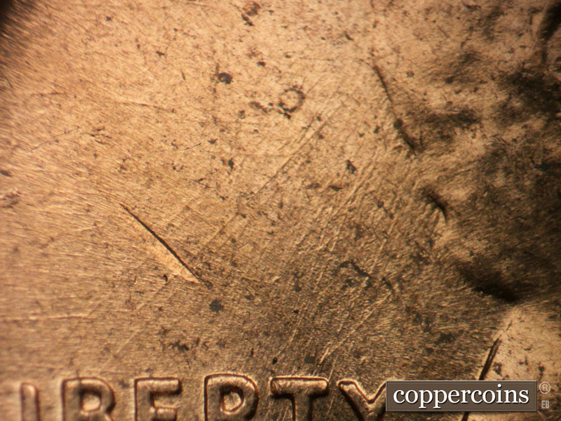 Die-stage B marker on 1960D•1MM•244 (1960 Repunched Mint Mark).