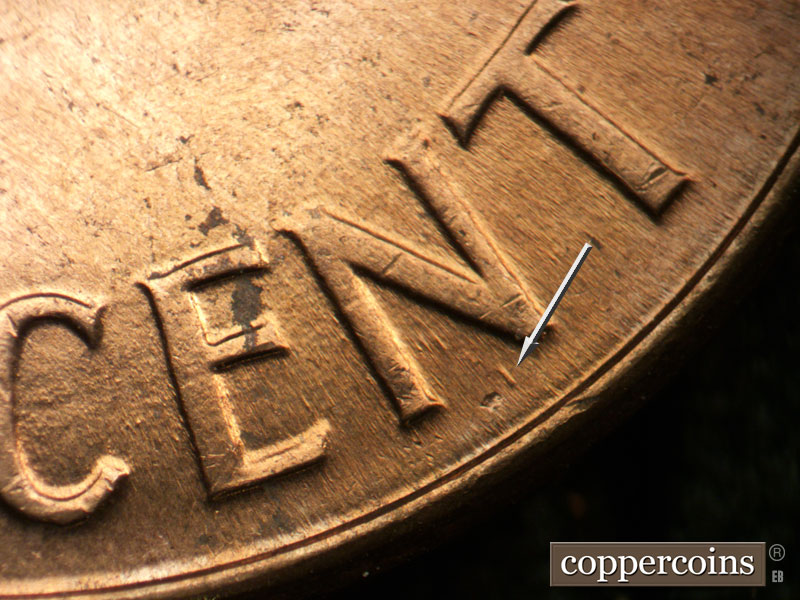 Die-stage B marker on 1960D•1MM•245 (1960 Repunched Mint Mark).