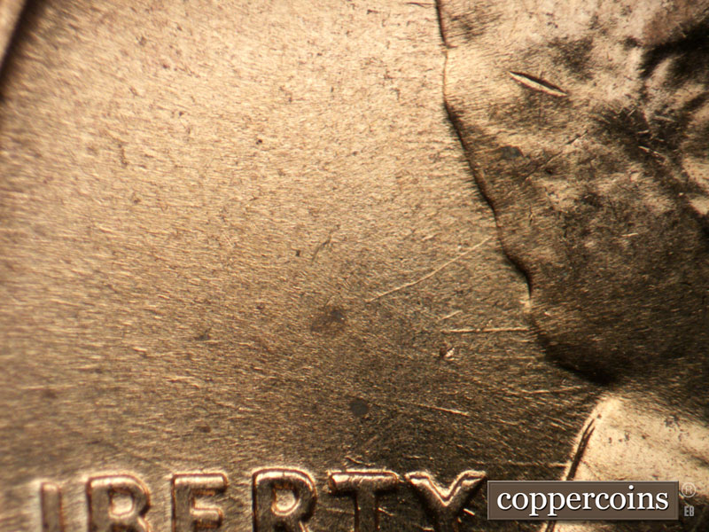 Die-stage B marker on 1960D•1MM•246 (1960 Repunched Mint Mark).