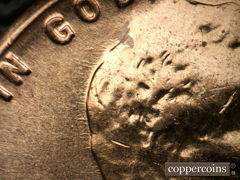 Die-stage B marker on 1960D•1MM•246 (1960 Repunched Mint Mark).