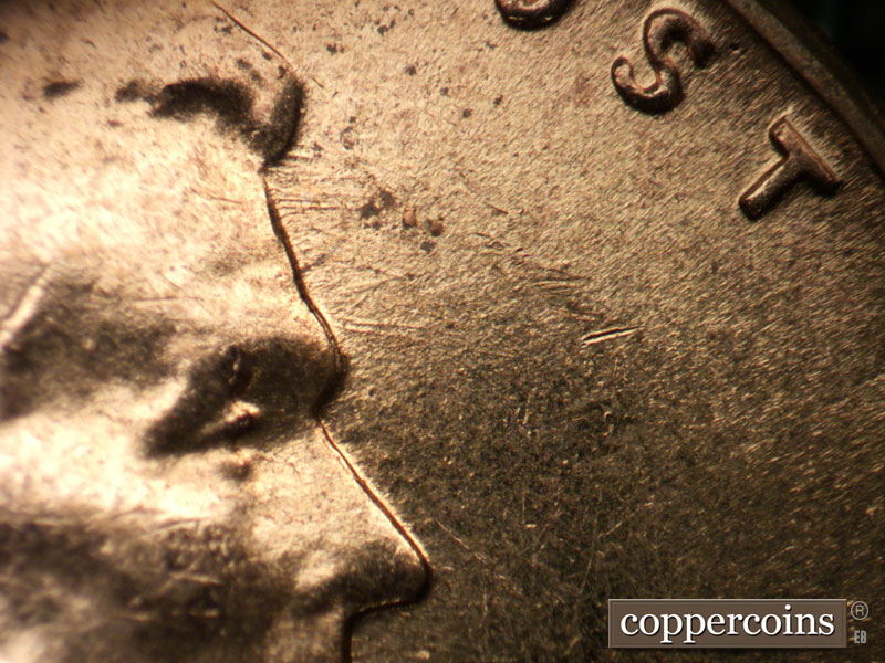 Die-stage B marker on 1960D•1MM•246 (1960 Repunched Mint Mark).