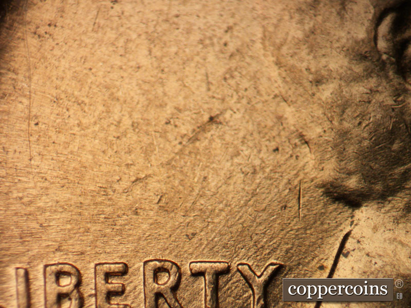 Die-stage B marker on 1960D•1MM•253 (1960 Repunched Mint Mark).