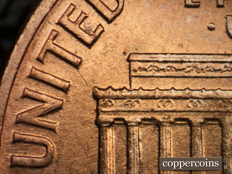 Die-stage B marker on 1960D•1MM•256 (1960 Repunched Mint Mark).