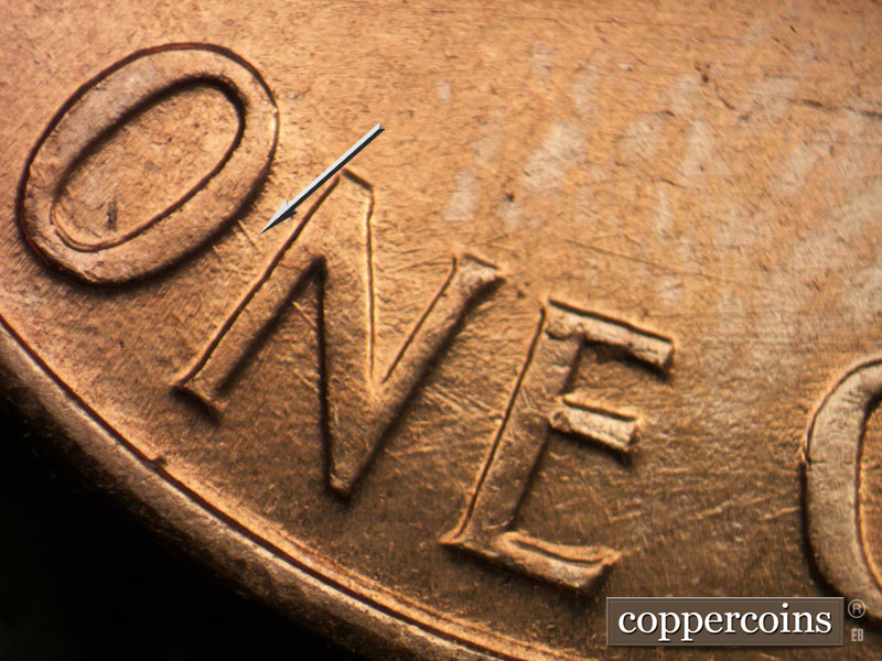 Die-stage B marker on 1960D•1MM•256 (1960 Repunched Mint Mark).