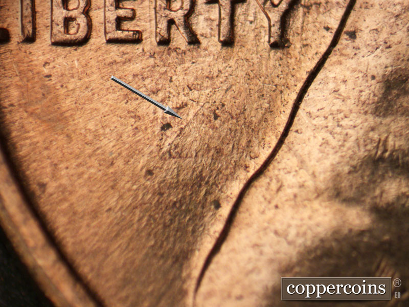 Die-stage B marker on 1960D•1MM•258 (1960 Repunched Mint Mark).