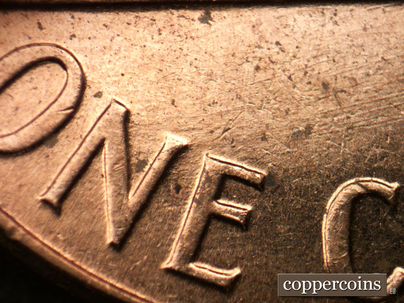 Die-stage B marker on 1960D•1MM•258 (1960 Repunched Mint Mark).