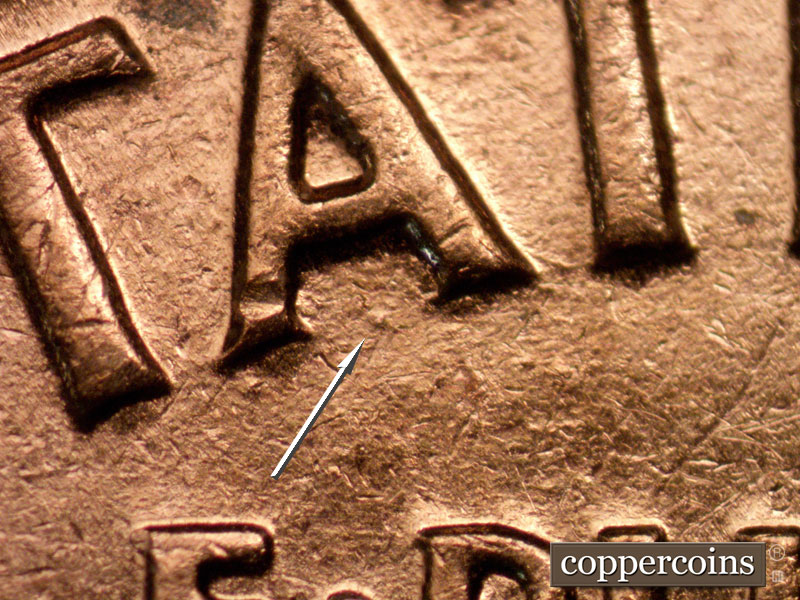 Die-stage B marker on 1960D•1MM•262 (1960 Repunched Mint Mark).