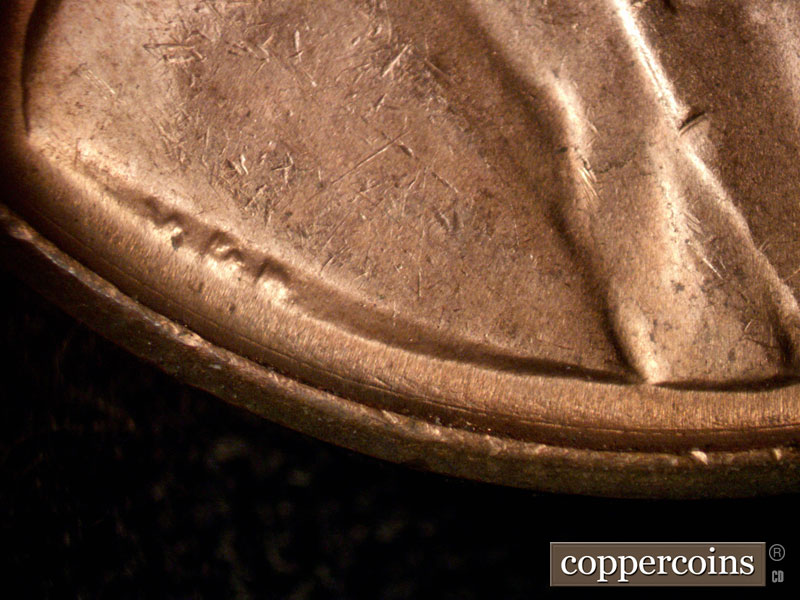 Die-stage B marker on 1960D•1MM•264 (1960 Repunched Mint Mark).