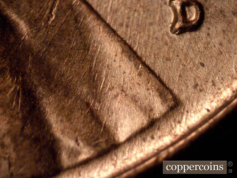 Die-stage B marker on 1960D•1MM•265 (1960 Repunched Mint Mark).