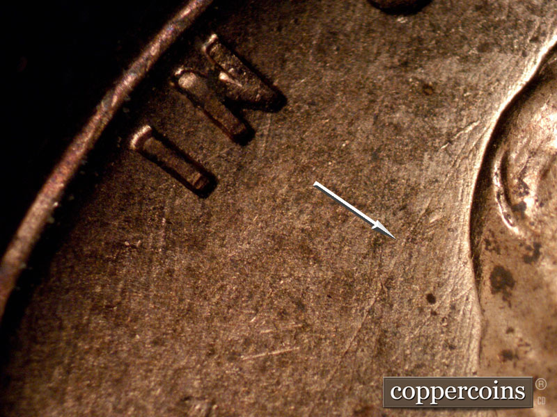 Die-stage B marker on 1960D•1MM•265 (1960 Repunched Mint Mark).