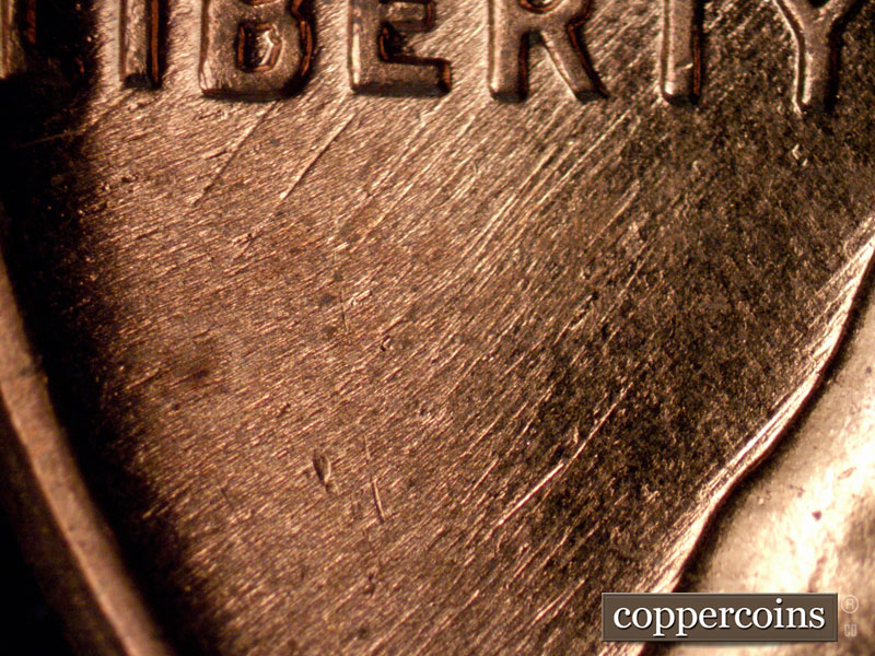 Die-stage B marker on 1960D•1MM•266 (1960 Repunched Mint Mark).