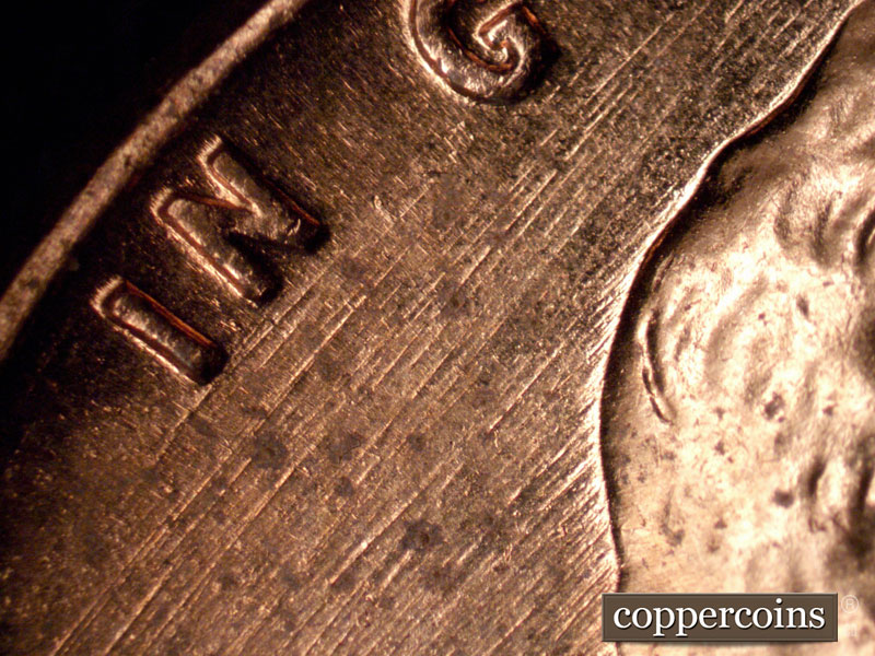 Die-stage B marker on 1960D•1MM•266 (1960 Repunched Mint Mark).