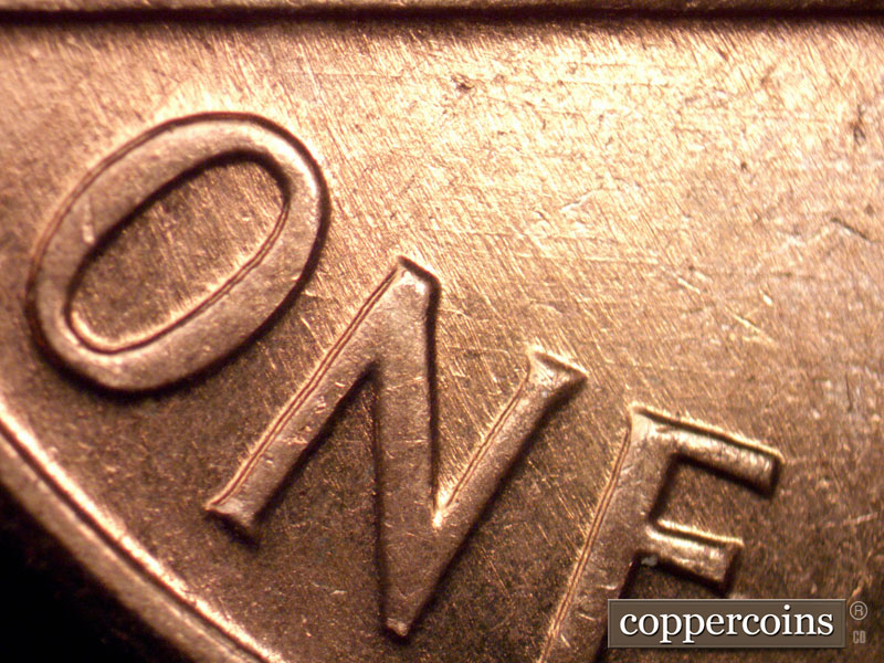 Die-stage B marker on 1960D•1MM•267 (1960 Repunched Mint Mark).