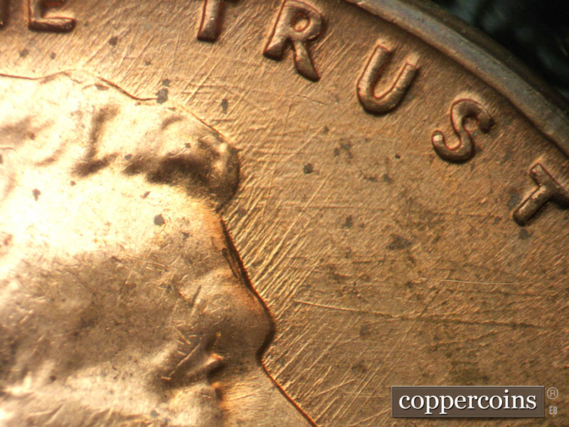 Die-stage B marker on 1960D•1MM•276 (1960 Repunched Mint Mark).