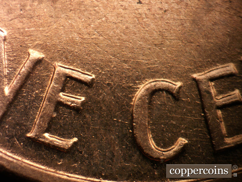 Die-stage B marker on 1960D•1MM•283 (1960 Repunched Mint Mark).