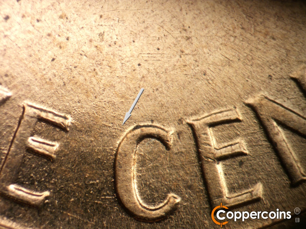 Die-stage B marker on 1960D•1MM•295 showing WNW die scratch from top back of C in CENT.