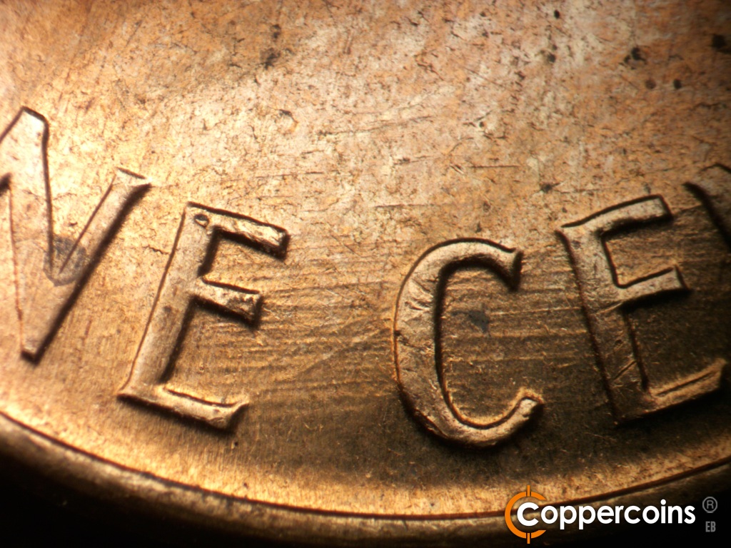 Die-stage C marker on 1960D•1MM•296 showing NE die scratch connects E in ONE to C in CENT.