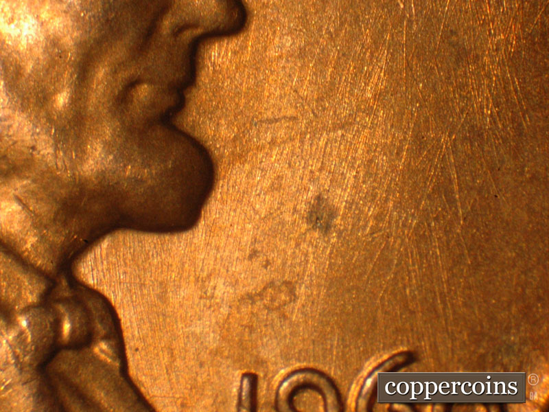 Die-stage B marker on 1960P•1DO•010 (1960 Doubled Die Obverse).