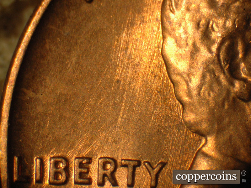 Die-stage B marker on 1960P•1DO•010 (1960 Doubled Die Obverse).