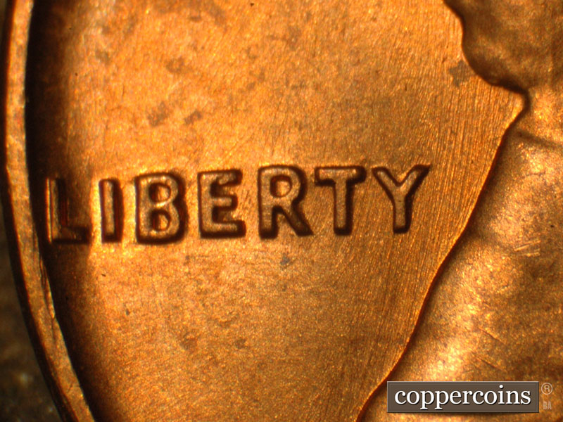 Die-stage B marker on 1960P•1DO•010 (1960 Doubled Die Obverse).