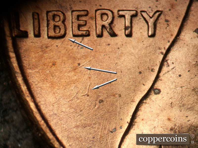 Die-stage B marker on 1960P•1DO•011 (1960 Doubled Die Obverse).