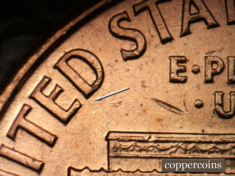 Die-stage B marker on 1960P•1DO•011 (1960 Doubled Die Obverse).
