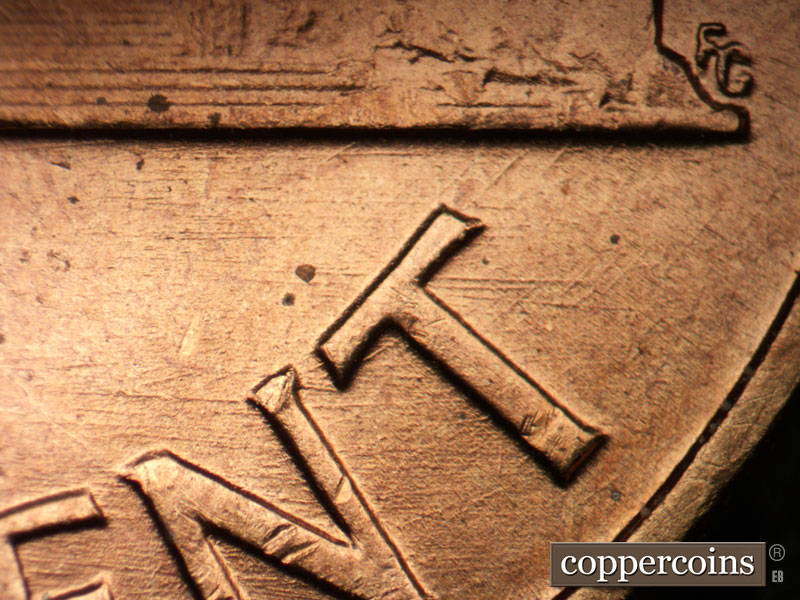 Die-stage B marker on 1960P•1DO•011 (1960 Doubled Die Obverse).