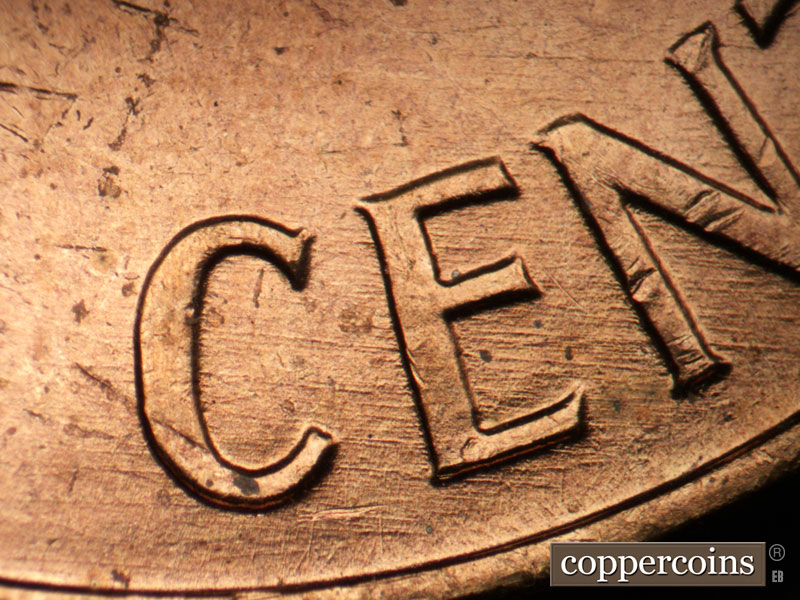 Die-stage B marker on 1960P•1DO•011 (1960 Doubled Die Obverse).