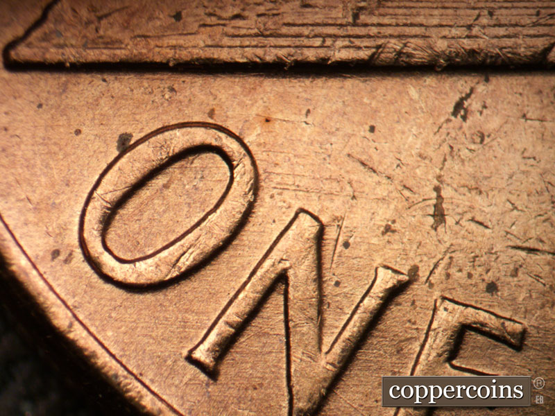 Die-stage B marker on 1960P•1DO•011 (1960 Doubled Die Obverse).