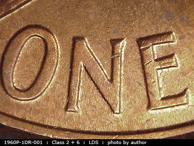 Die-stage C marker on 1960P•1DR•001 (1960 Doubled Die Reverse).