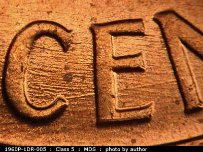 Die-stage B marker on 1960P•1DR•005 (1960 Doubled Die Reverse).