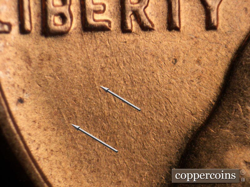Die-stage B marker on 1961D•1DO•002 (1961 Doubled Die Obverse).