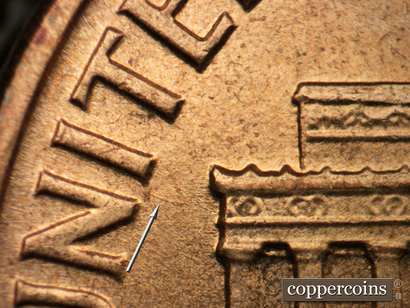 Die-stage B marker on 1961D•1DO•002 (1961 Doubled Die Obverse).