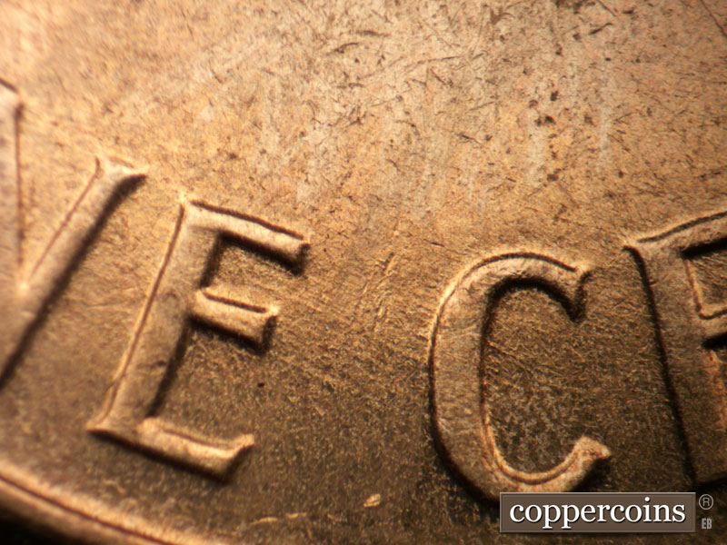Die-stage B marker on 1961D•1DO•002 (1961 Doubled Die Obverse).