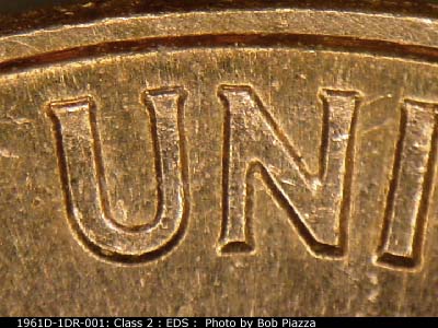 Die-stage A marker on 1961D•1DR•001 (1961 Doubled Die Reverse).