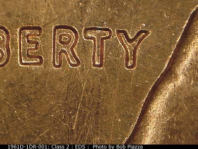 Die-stage A marker on 1961D•1DR•001 (1961 Doubled Die Reverse).
