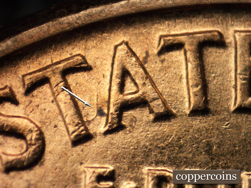 Die-stage B marker on 1961D•1DR•002 (1961 Doubled Die Reverse).