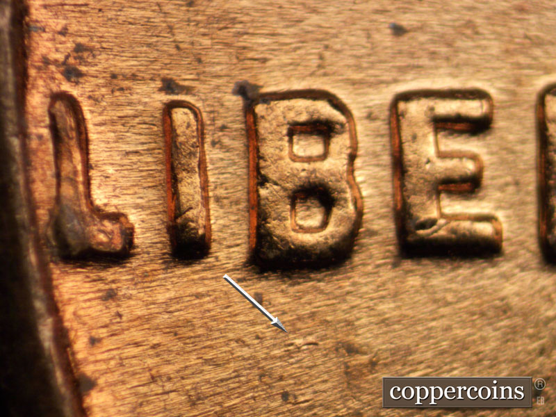 Die-stage B marker on 1961D•1DR•002 (1961 Doubled Die Reverse).