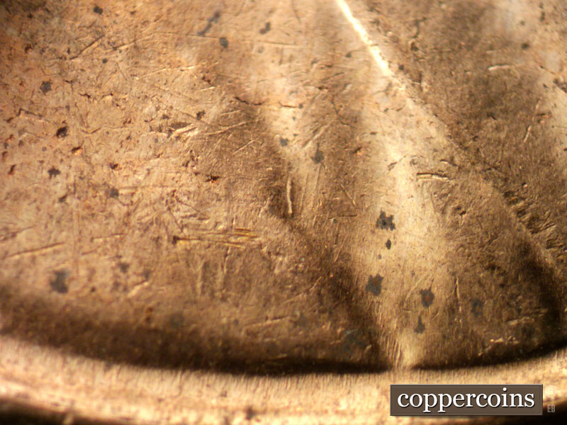 Die-stage A marker on 1961D•1MM•002 (1961 Repunched Mint Mark).