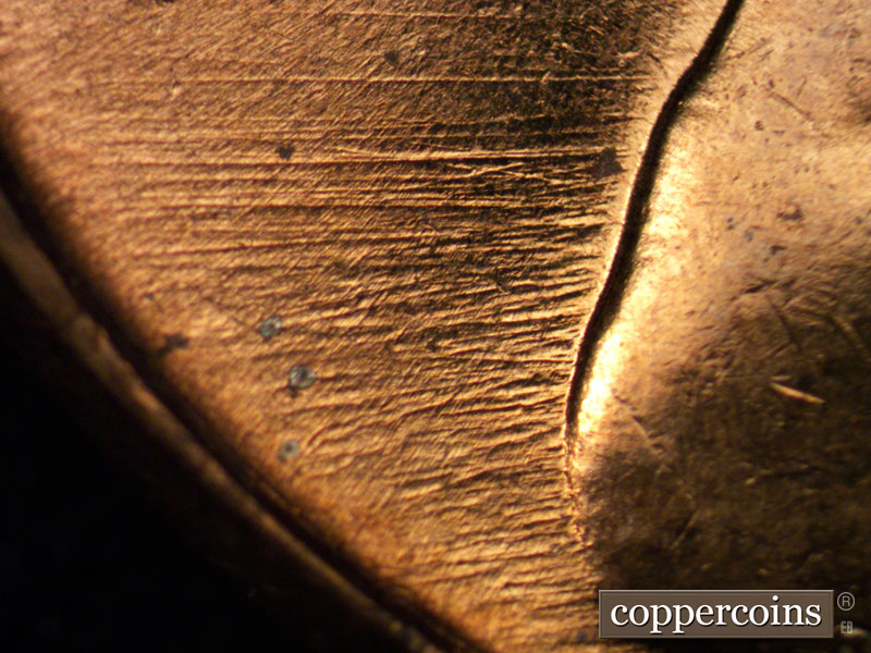 Die-stage B marker on 1961D•1MM•002 (1961 Repunched Mint Mark).