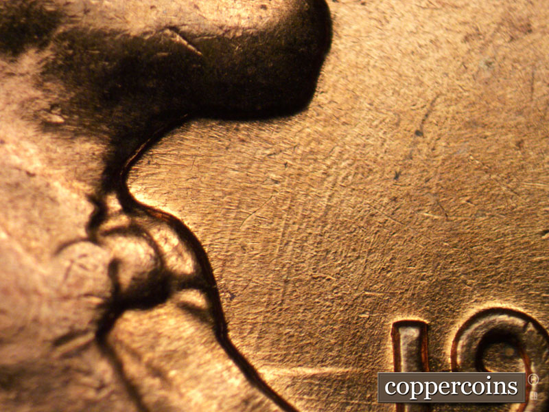 Die-stage B marker on 1961D•1MM•002 (1961 Repunched Mint Mark).