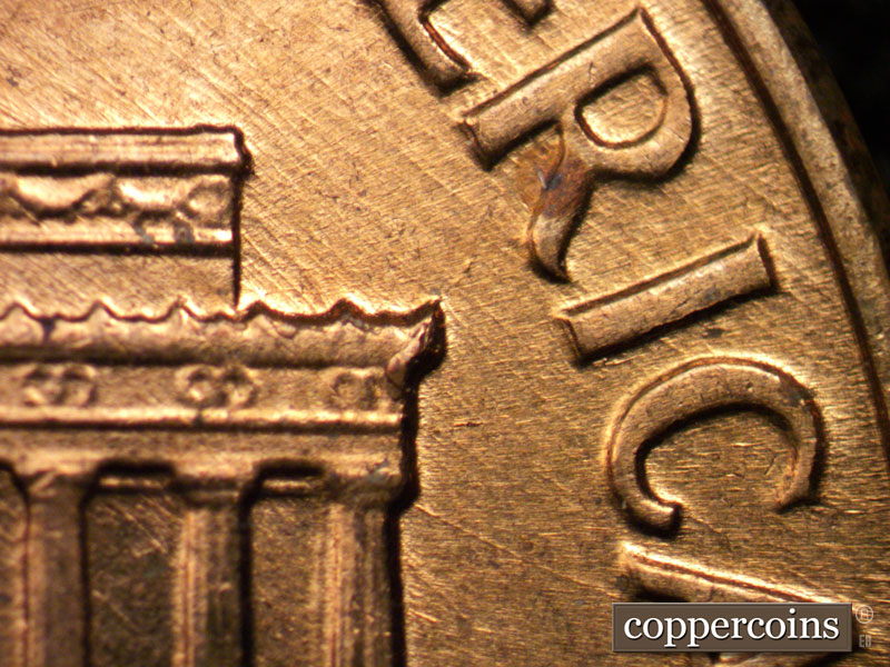 Die-stage B marker on 1961D•1MM•002 (1961 Repunched Mint Mark).