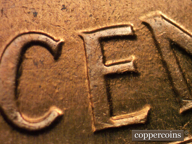 Die-stage B marker on 1961D•1MM•002 (1961 Repunched Mint Mark).