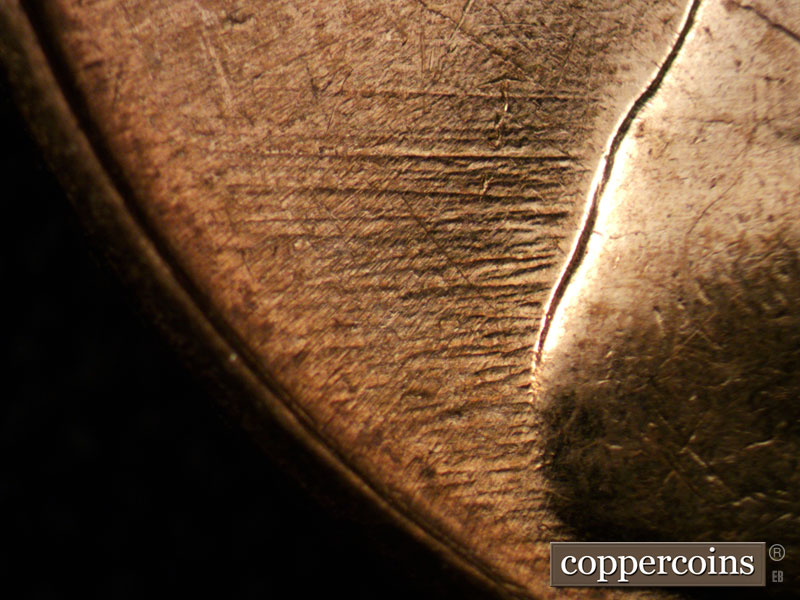 Die-stage C marker on 1961D•1MM•002 (1961 Repunched Mint Mark).
