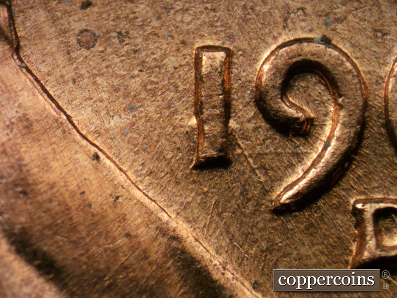 Die-stage B marker on 1961D•1MM•004 (1961 Repunched Mint Mark).